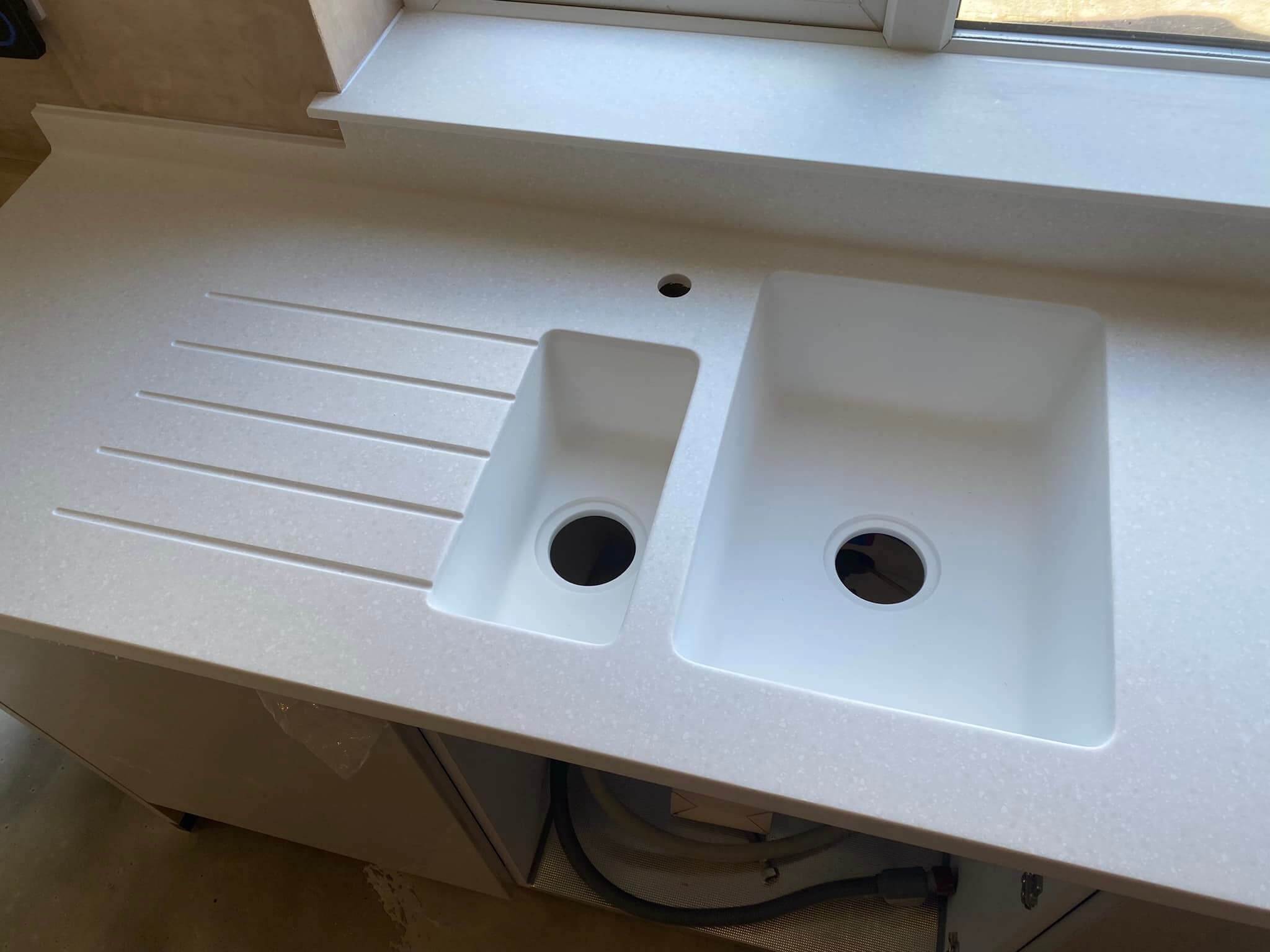 kitchen with corian worktops